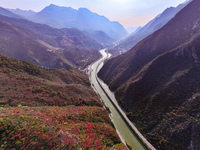 Vehicles drive on the Guzhao water highway in Xingshan County, Yichang City, Central China's Hubei Province, on December 18, 2024. (