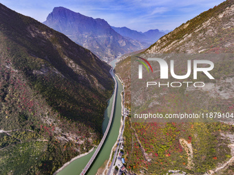 Vehicles drive on the Guzhao water highway in Xingshan County, Yichang City, Central China's Hubei Province, on December 18, 2024. (