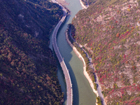 Vehicles drive on the Guzhao water highway in Xingshan County, Yichang City, Central China's Hubei Province, on December 18, 2024. (