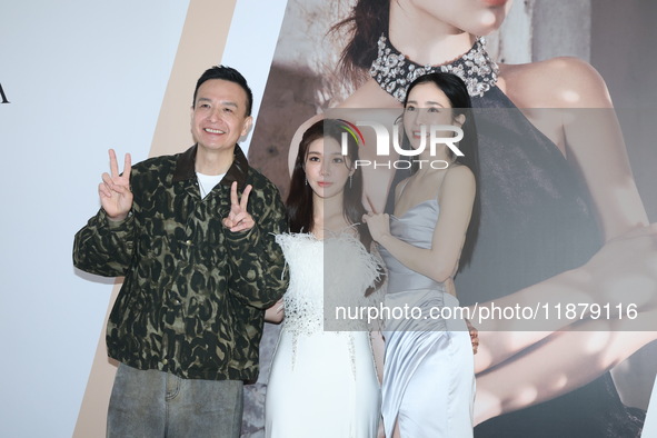 Dolly, a member of the girl group G.O.F., Taiwanese singer Jason, and actress Nikita attend the opening ceremony of the dress brand in Taipe...