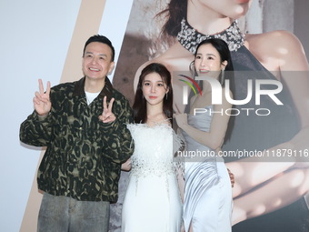 Dolly, a member of the girl group G.O.F., Taiwanese singer Jason, and actress Nikita attend the opening ceremony of the dress brand in Taipe...