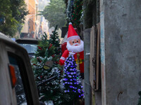 A shop sells decoration items for Christmas at a market ahead of Christmas in Kolkata, India, on December 18, 2024. (