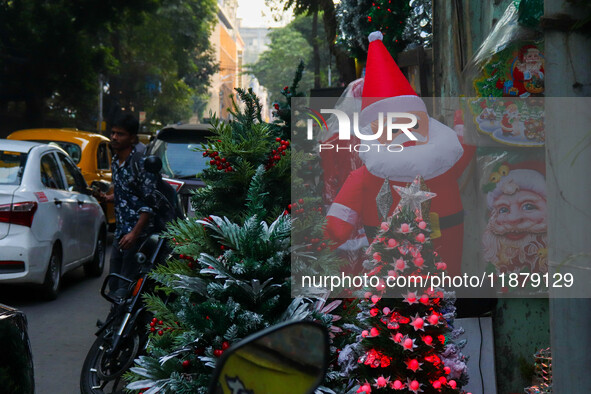 A shop sells decoration items for Christmas at a market ahead of Christmas in Kolkata, India, on December 18, 2024. 