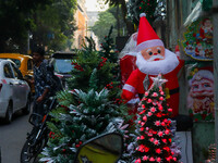 A shop sells decoration items for Christmas at a market ahead of Christmas in Kolkata, India, on December 18, 2024. (