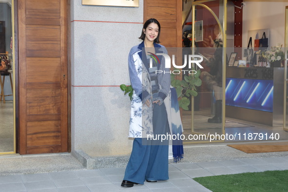 Taiwanese hostess Patty Lee Pei-yu attends the opening event of a department store in Taipei, China, on December 18, 2024. 