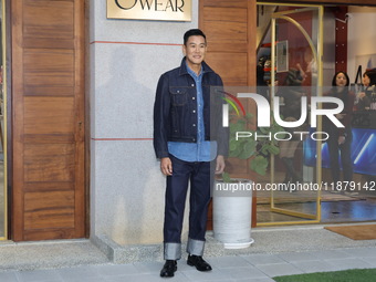 Japanese actor Kagami Tomohisa attends the opening of the department store in Taipei, Taiwan Province, China, on December 18, 2024. (