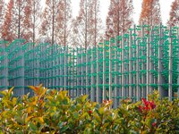 More than 30,000 green plastic beer bottles form a ''beer jungle'' by Tangdao Bay in the West Coast New District of Qingdao, Shandong provin...