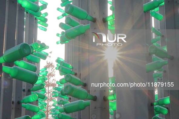 More than 30,000 green plastic beer bottles form a ''beer jungle'' by Tangdao Bay in the West Coast New District of Qingdao, Shandong provin...