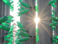 More than 30,000 green plastic beer bottles form a ''beer jungle'' by Tangdao Bay in the West Coast New District of Qingdao, Shandong provin...