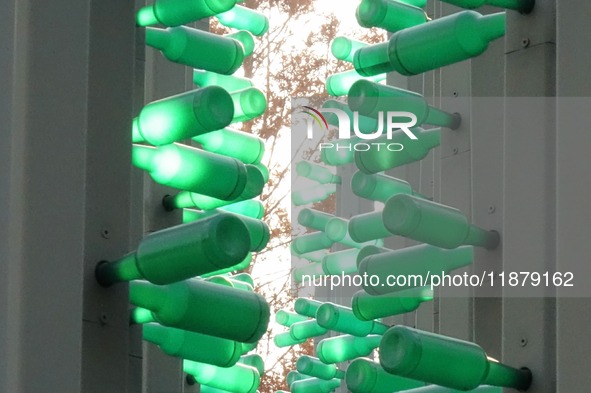 More than 30,000 green plastic beer bottles form a ''beer jungle'' by Tangdao Bay in the West Coast New District of Qingdao, Shandong provin...