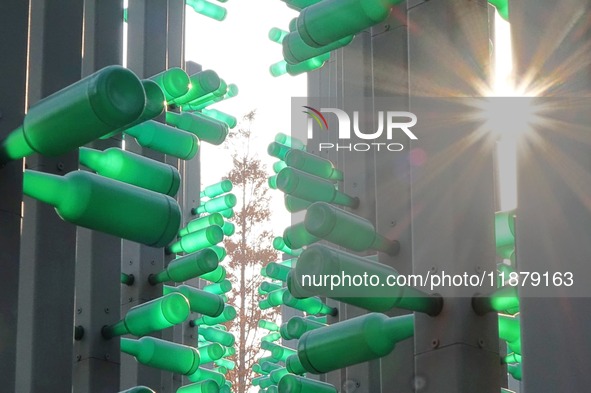 More than 30,000 green plastic beer bottles form a ''beer jungle'' by Tangdao Bay in the West Coast New District of Qingdao, Shandong provin...