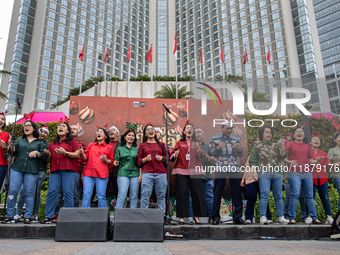 The choir group of the DKI Jakarta Provincial Government performs during the Christmas Carol to celebrate the upcoming Christmas in Jakarta,...