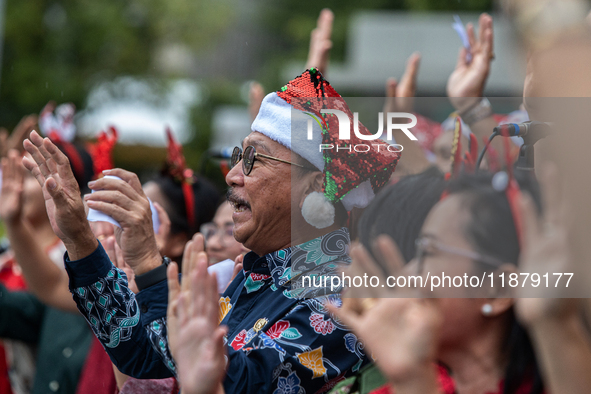 The choir group of the DKI Jakarta Provincial Government performs during the Christmas Carol to celebrate the upcoming Christmas in Jakarta,...