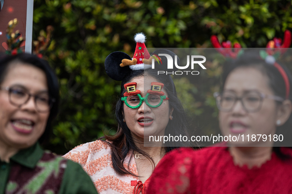 The choir group of the DKI Jakarta Provincial Government performs during the Christmas Carol to celebrate the upcoming Christmas in Jakarta,...