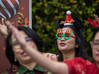 The choir group of the DKI Jakarta Provincial Government performs during the Christmas Carol to celebrate the upcoming Christmas in Jakarta,...