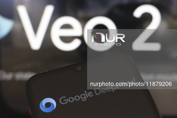 The Google DeepMind logo appears on a smartphone screen, and in the background, the Veo 2 page, in this illustration photo in Reno, United S...