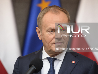 Polish Prime Minister Donald Tusk holds a press conference before his departure to Brussels in Warsaw, Poland, on December 18, 2024. (