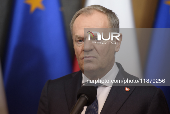 Polish Prime Minister Donald Tusk holds a press conference before his departure to Brussels in Warsaw, Poland, on December 18, 2024. 