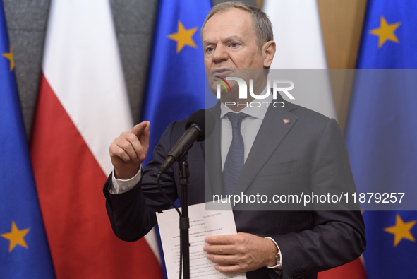 Polish Prime Minister Donald Tusk holds a press conference before his departure to Brussels in Warsaw, Poland, on December 18, 2024. 