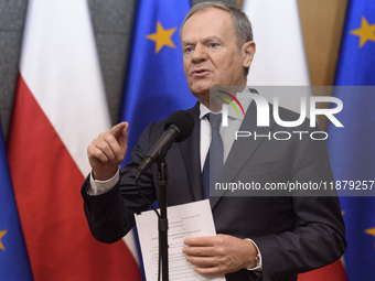 Polish Prime Minister Donald Tusk holds a press conference before his departure to Brussels in Warsaw, Poland, on December 18, 2024. (