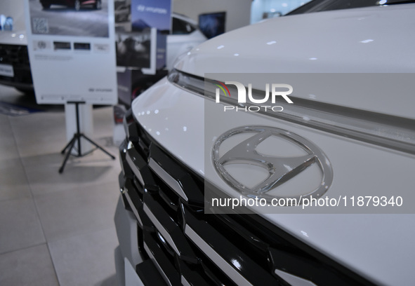 A Hyundai Hybrid logo is displayed at a dealership in Malang, Indonesia, on December 18, 2024. Hyundai sales reach only 20,528 units from Ja...