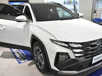 Hyundai cars of various types (hybrid, electric, and gasoline) are displayed at a dealership in Malang, East Java, Indonesia, on December 18...