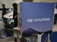 Hyundai cars of various types (hybrid, electric, and gasoline) are displayed at a dealership in Malang, East Java, Indonesia, on December 18...