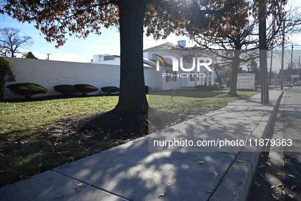 Blood is on the sidewalk and there is damage outside of Johnson Funeral Home on Loch Raven Boulevard following a mass shooting that results...