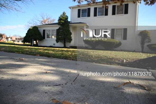 Blood is on the sidewalk and there is damage outside of Johnson Funeral Home on Loch Raven Boulevard following a mass shooting that results...