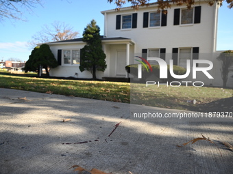 Blood is on the sidewalk and there is damage outside of Johnson Funeral Home on Loch Raven Boulevard following a mass shooting that results...