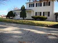 Blood is on the sidewalk and there is damage outside of Johnson Funeral Home on Loch Raven Boulevard following a mass shooting that results...