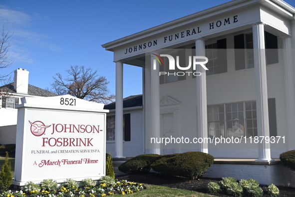 Blood is on the sidewalk and there is damage outside of Johnson Funeral Home on Loch Raven Boulevard following a mass shooting that results...