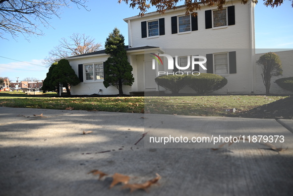 Blood is on the sidewalk and there is damage outside of Johnson Funeral Home on Loch Raven Boulevard following a mass shooting that results...