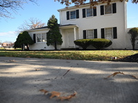 Blood is on the sidewalk and there is damage outside of Johnson Funeral Home on Loch Raven Boulevard following a mass shooting that results...