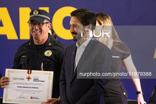 The mayor of Sao Paulo, Ricardo Nunes, participates in the presentation of the ''Medalha Heroi Paulistano'' at Praca das Artes in Sao Paulo,...