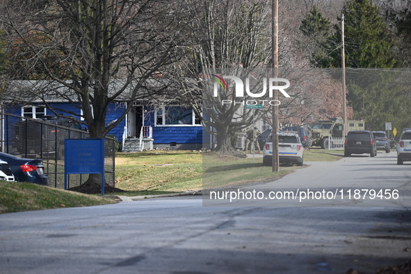 SWAT and police work on a barricaded situation at a home in the area of Virginia Avenue and Bosley Avenue in Cockeysville, Maryland, United...