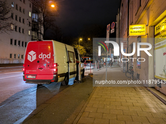 A DPD delivery van parks on a city street in Munich, Bavaria, Germany, in December 2024. The Verdi trade union calls for warning strikes at...