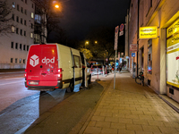 A DPD delivery van parks on a city street in Munich, Bavaria, Germany, in December 2024. The Verdi trade union calls for warning strikes at...