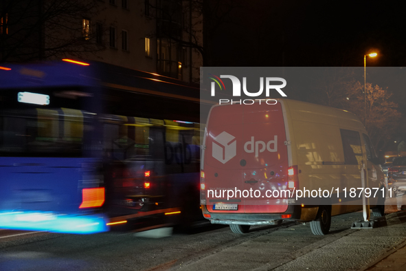 A DPD delivery van parks on a city street in Munich, Bavaria, Germany, in December 2024. The Verdi trade union calls for warning strikes at...