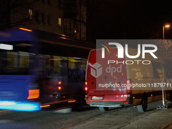 A DPD delivery van parks on a city street in Munich, Bavaria, Germany, in December 2024. The Verdi trade union calls for warning strikes at...