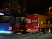 A DPD delivery van parks on a city street in Munich, Bavaria, Germany, in December 2024. The Verdi trade union calls for warning strikes at...