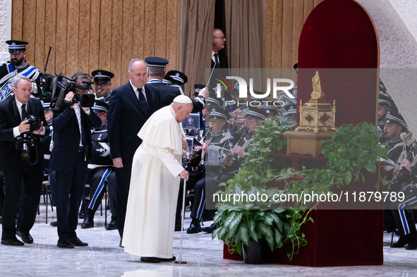 Pope Francis attends his Wednesday General Audience at Paul VI Hall in Vatican City, Vatican, on December 18, 2024. 