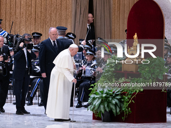 Pope Francis attends his Wednesday General Audience at Paul VI Hall in Vatican City, Vatican, on December 18, 2024. (