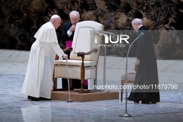 Pope Francis attends his Wednesday General Audience at Paul VI Hall in Vatican City, Vatican, on December 18, 2024. 