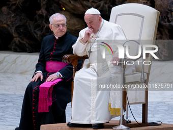 Pope Francis attends his Wednesday General Audience at Paul VI Hall in Vatican City, Vatican, on December 18, 2024. (