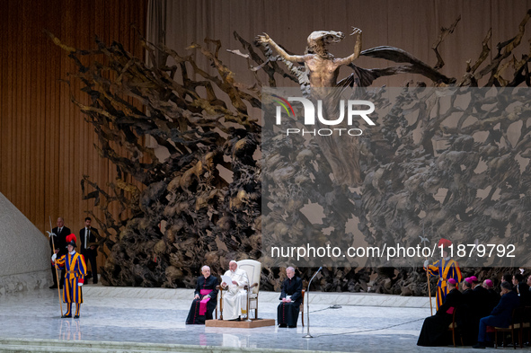 Pope Francis attends his Wednesday General Audience at Paul VI Hall in Vatican City, Vatican, on December 18, 2024. 