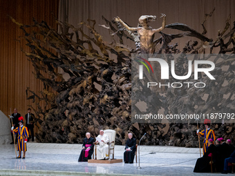 Pope Francis attends his Wednesday General Audience at Paul VI Hall in Vatican City, Vatican, on December 18, 2024. (