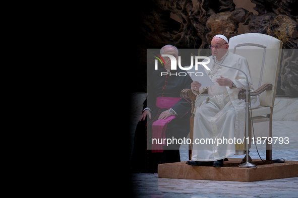 Pope Francis attends his Wednesday General Audience at Paul VI Hall in Vatican City, Vatican, on December 18, 2024. 