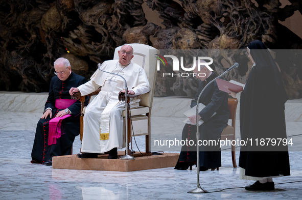 Pope Francis attends his Wednesday General Audience at Paul VI Hall in Vatican City, Vatican, on December 18, 2024. 