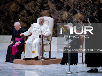 Pope Francis attends his Wednesday General Audience at Paul VI Hall in Vatican City, Vatican, on December 18, 2024. (